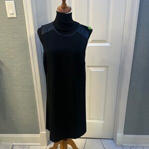 C. Wonder Black Sleeveless Mini Dress